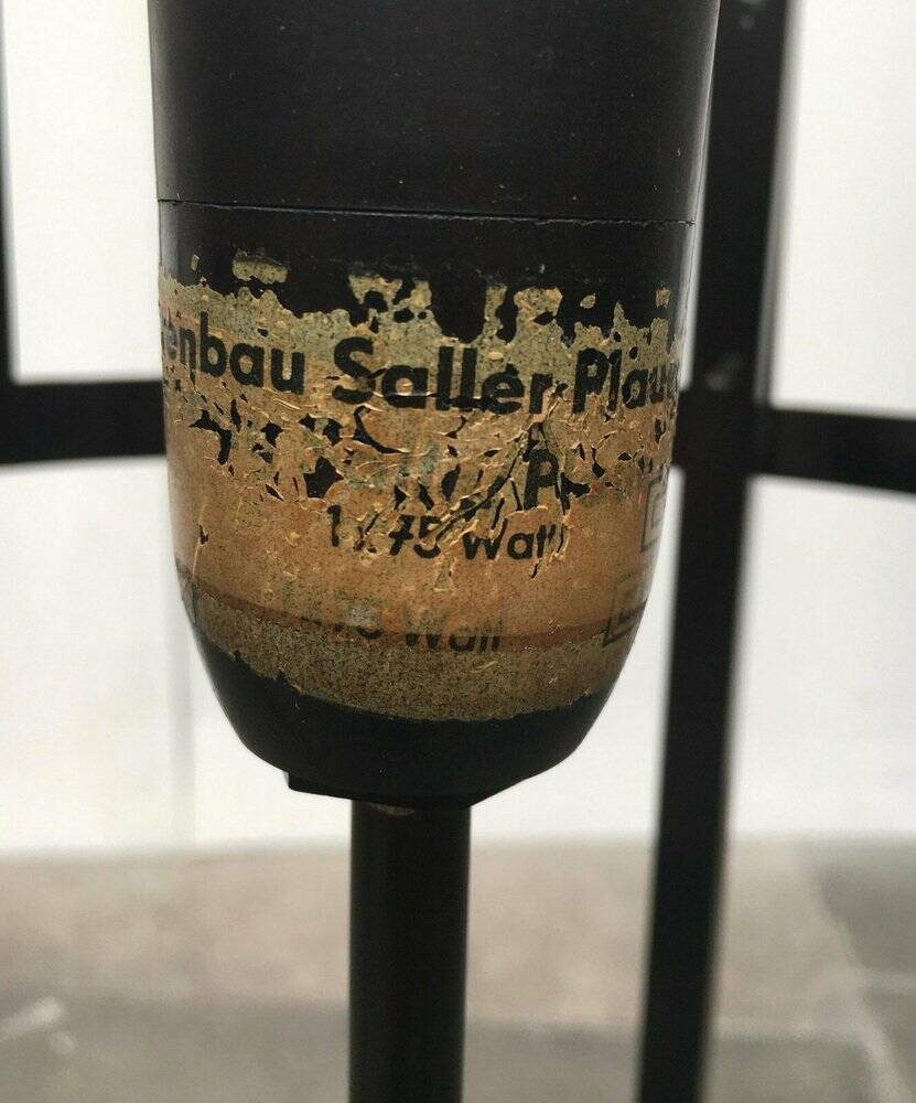 Mid-century tripod rocket floor lamp from the GDR of East Germany by Leuchtenbau Saller, 1960s.