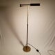 Articulated brass floor lamp