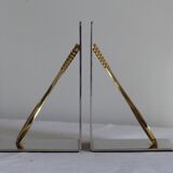 Pair of bookends, tennis racket.