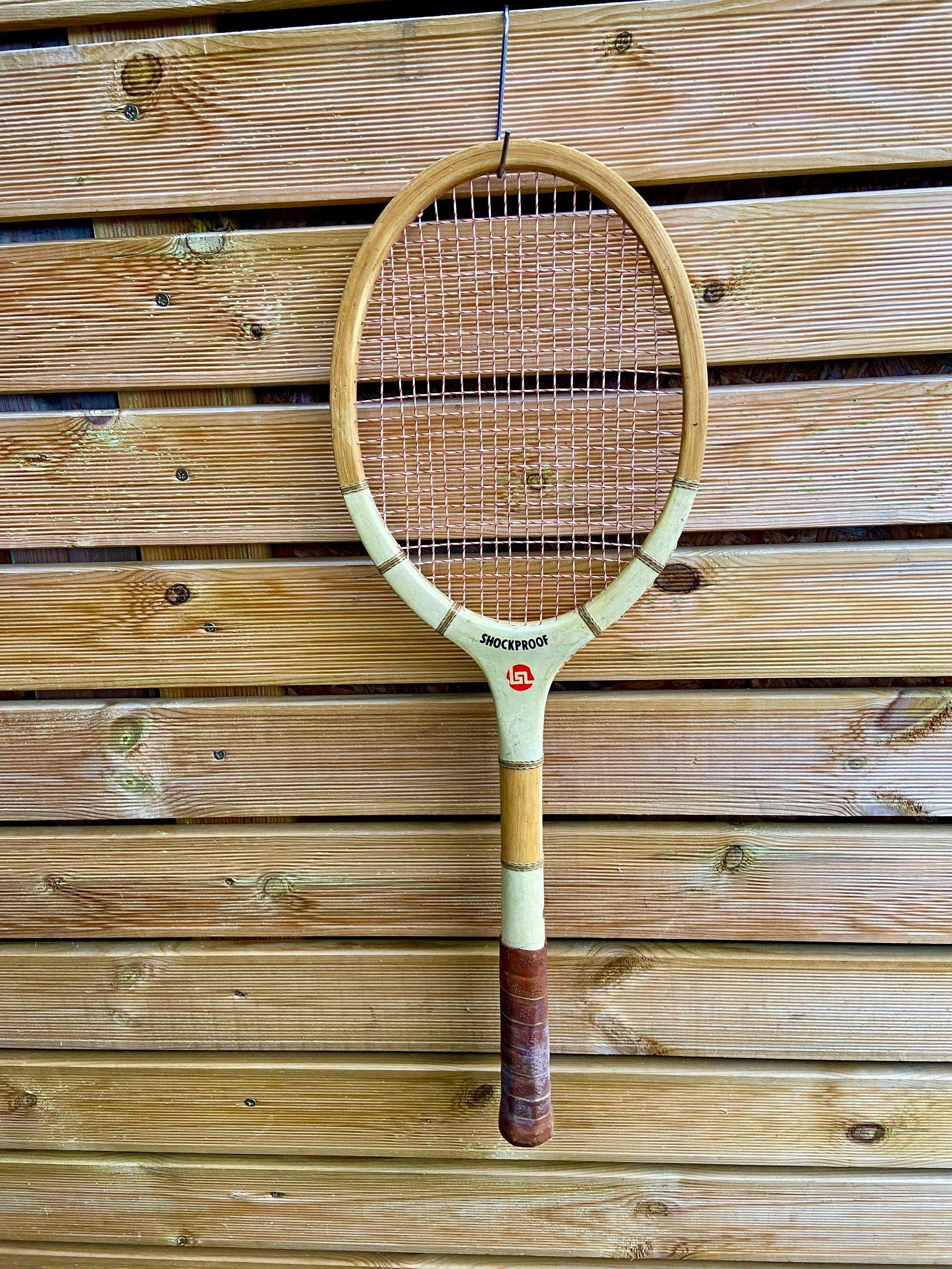 Ancienne raquette de tennis shockproof