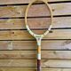 Ancienne raquette de tennis shockproof