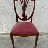 Set of 6 wooden chairs sitting red