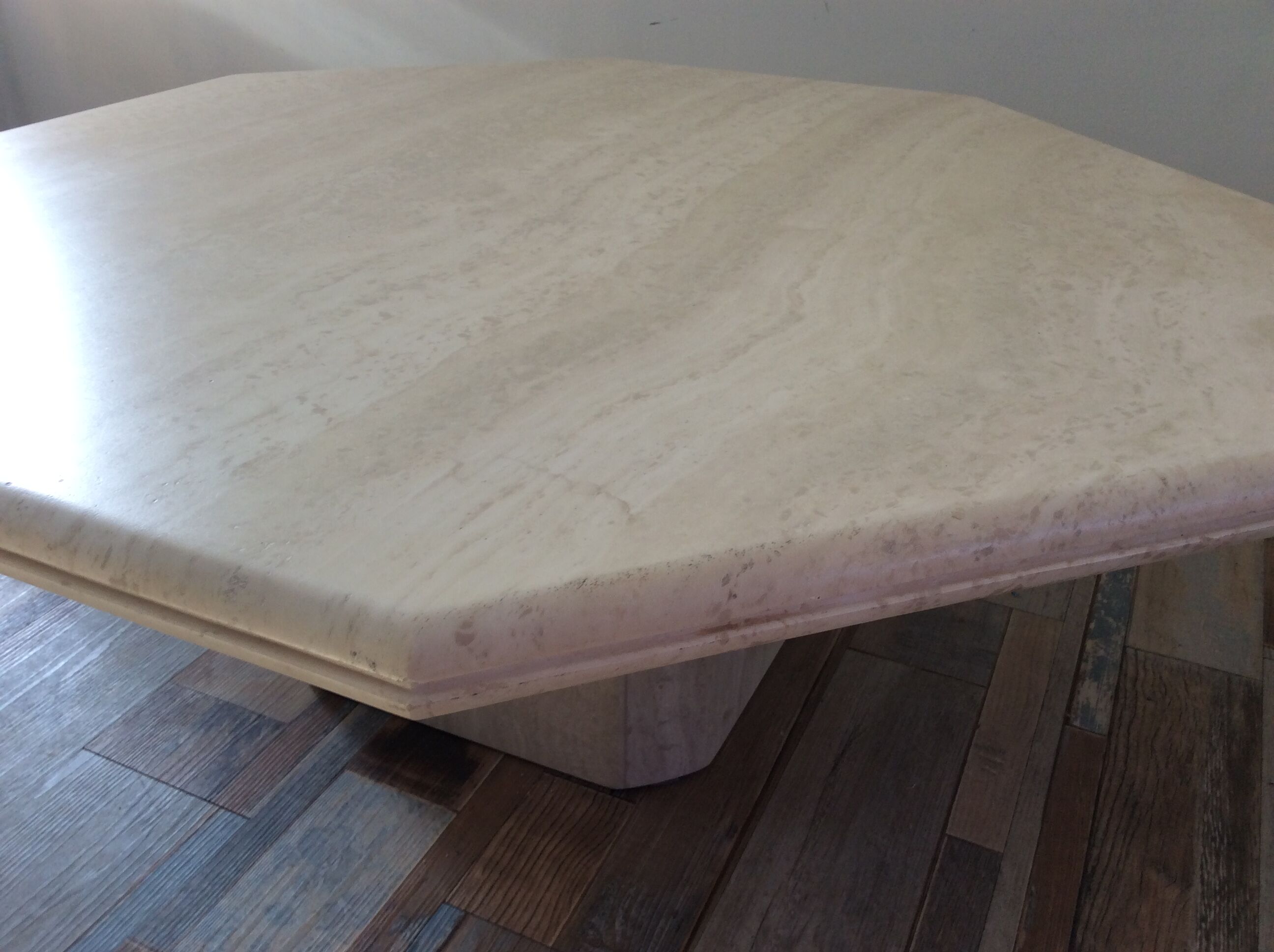Octagonal coffee table in travertine
