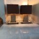 Imposing pair of lamps in Burgundy stone and brass art deco period