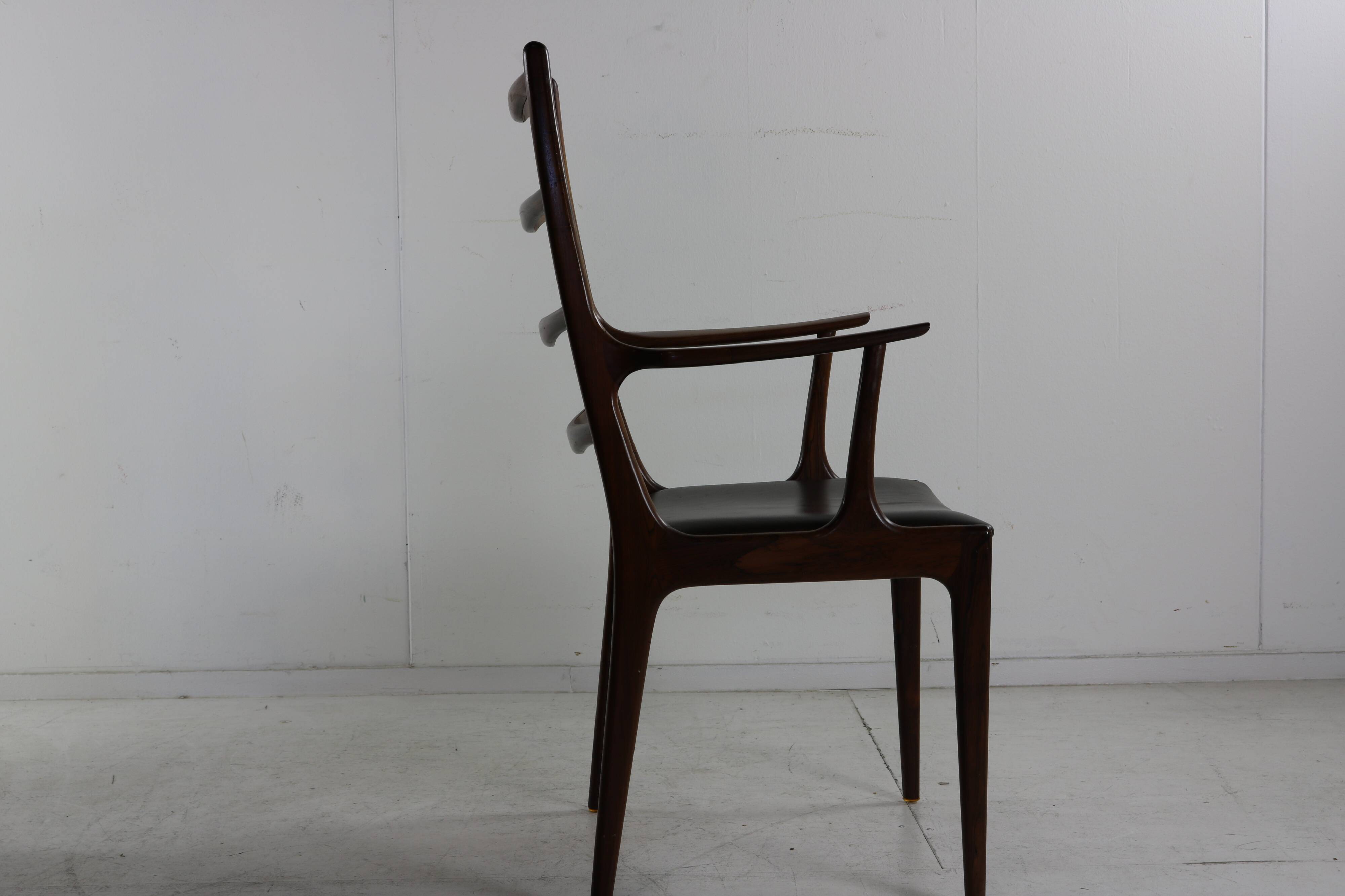 Grained rosewood danish design armchair by Johannes Andersen