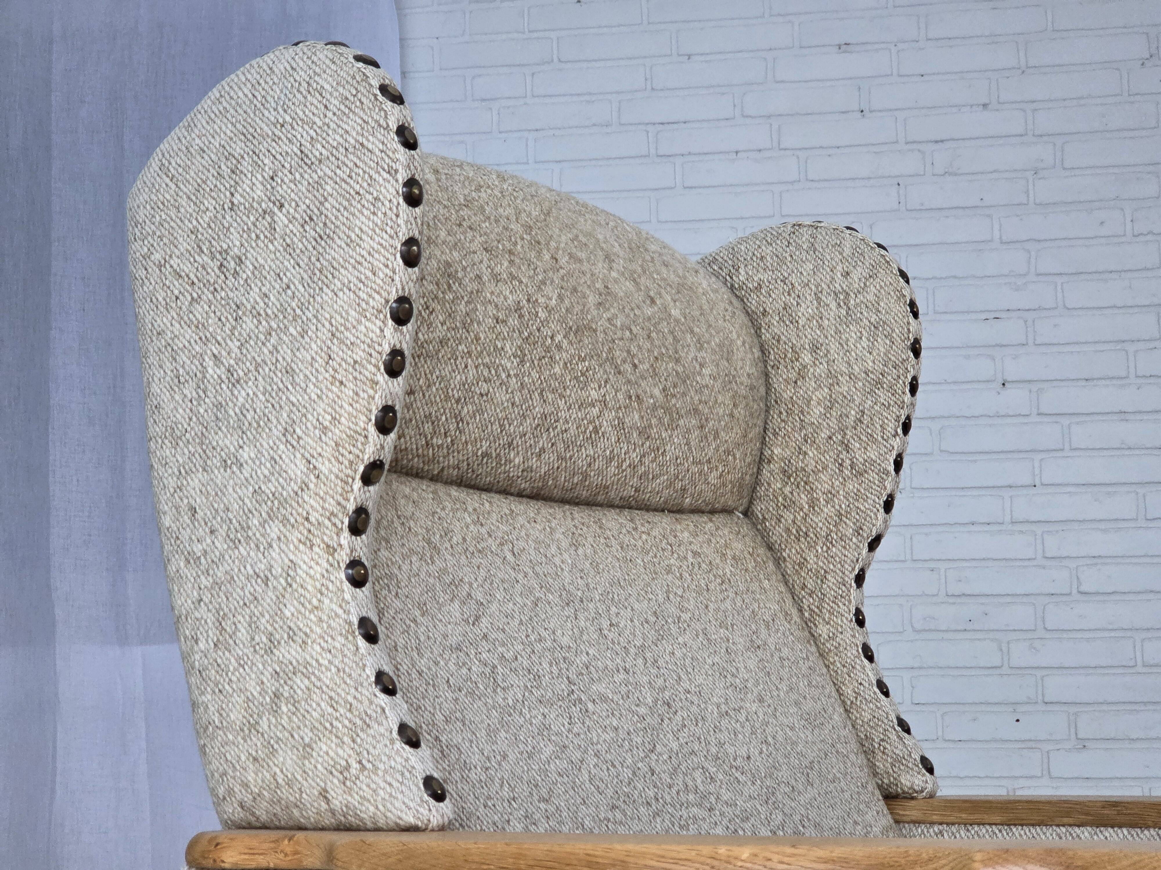 1970s, Danish highback armchair, furniture wool, solid oak wood.