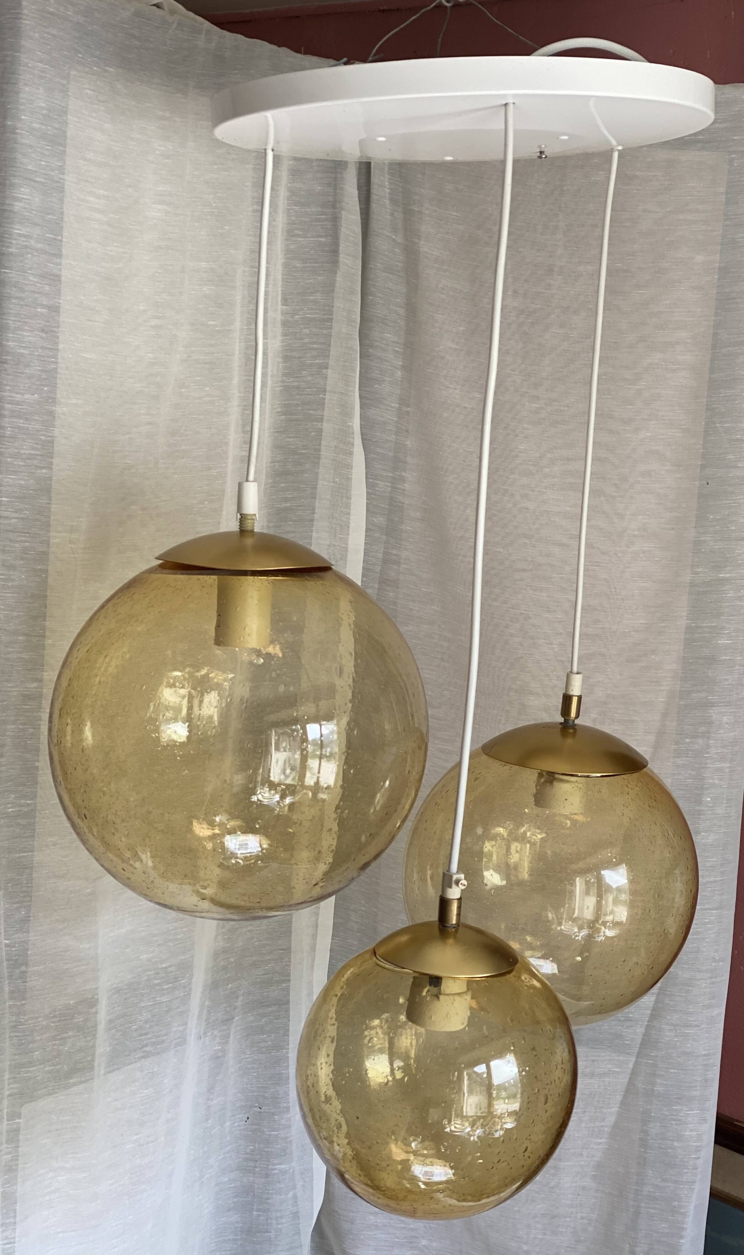Suspension cascade with 3 globes of vintage golden yellow bubbles from the 1970s.