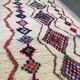 Moroccan Berber rug in cream wool with multicoloured diamonds – 250 × 147 cm