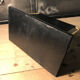 Vintage leather and brass office mail holder