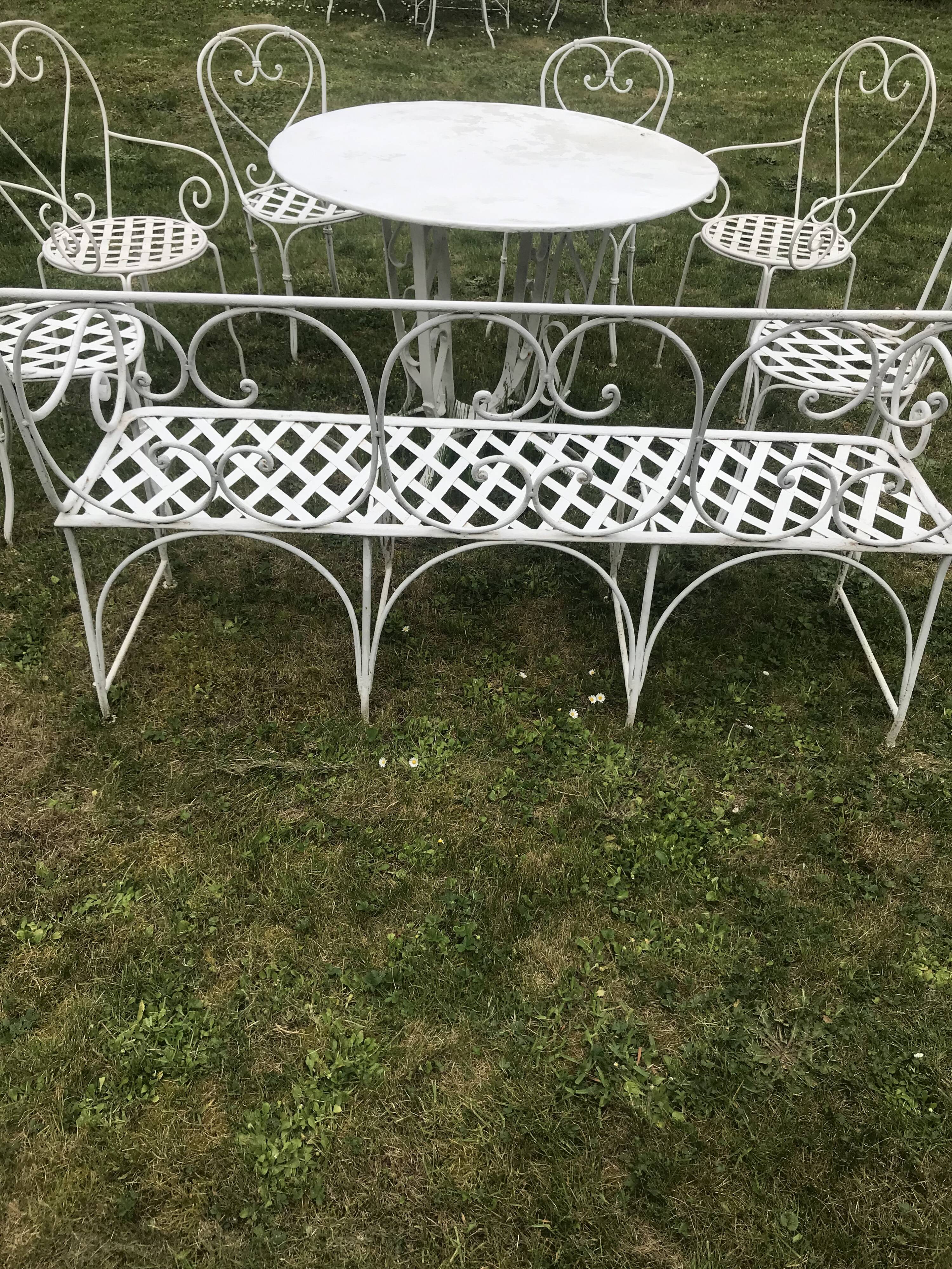 Antique wrought iron garden furniture