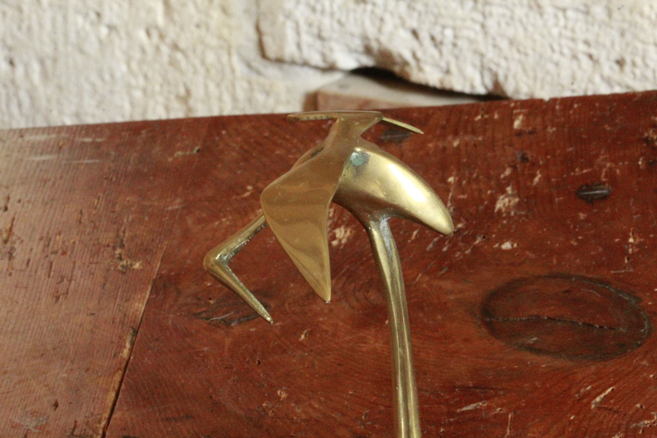 Brass heron statue