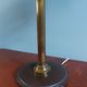 Brown leather desk lamp and brass foot, 70s