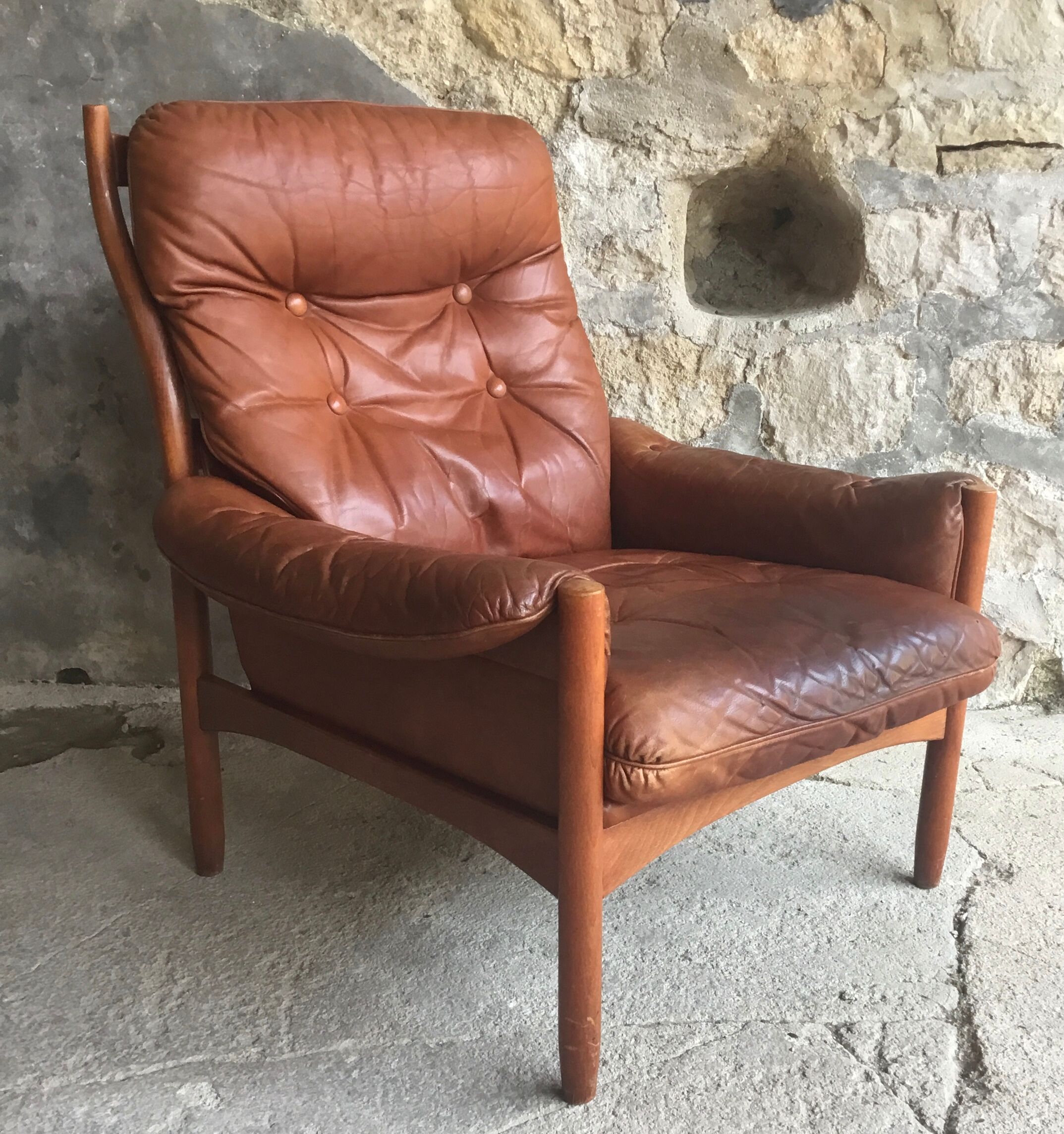 Scandinavian armchair in teak and leather - 1960