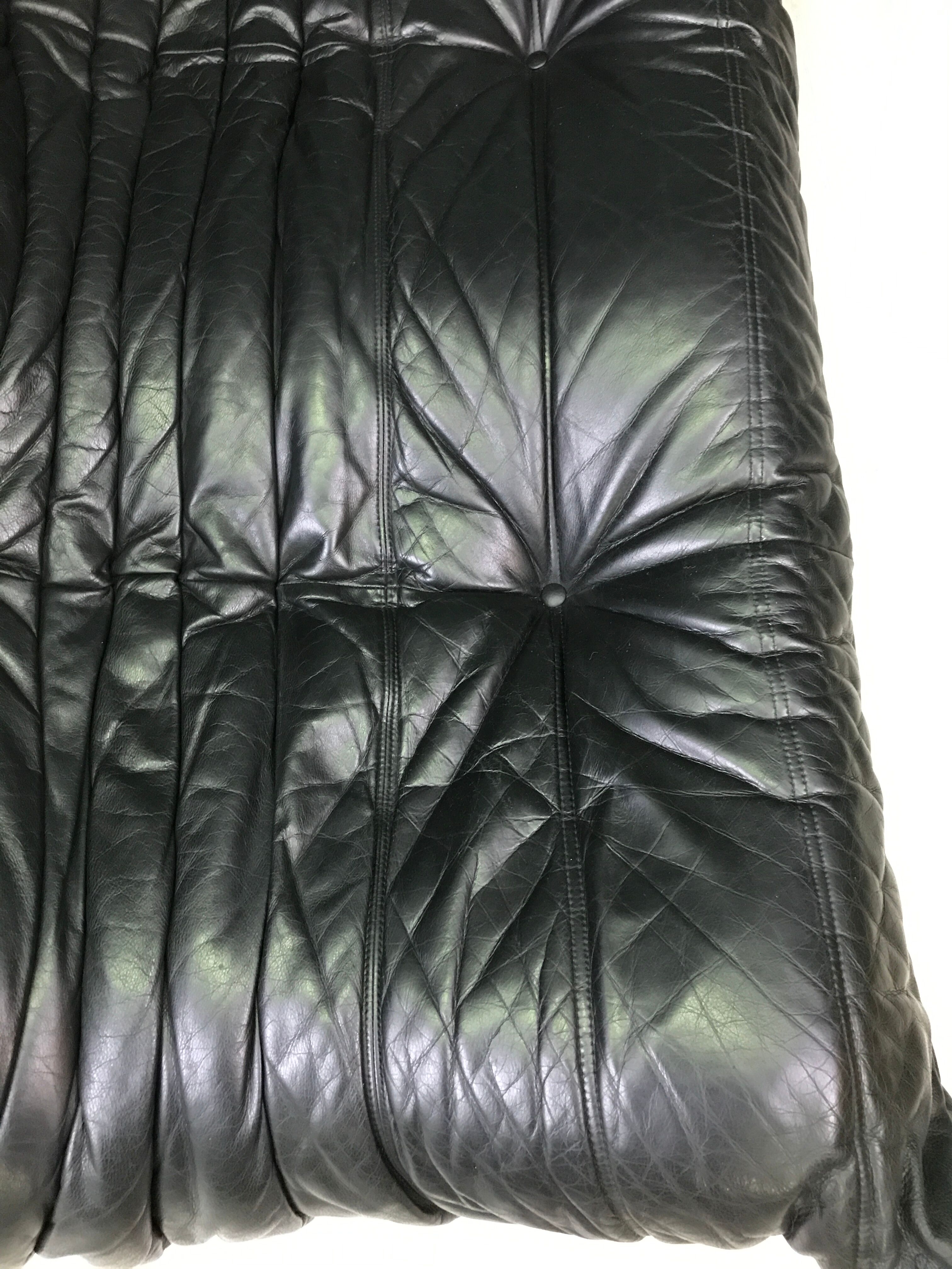 Black leather three seater sofa Togo by Ligne Roset