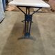 Antique bistro table in cast iron and marble.