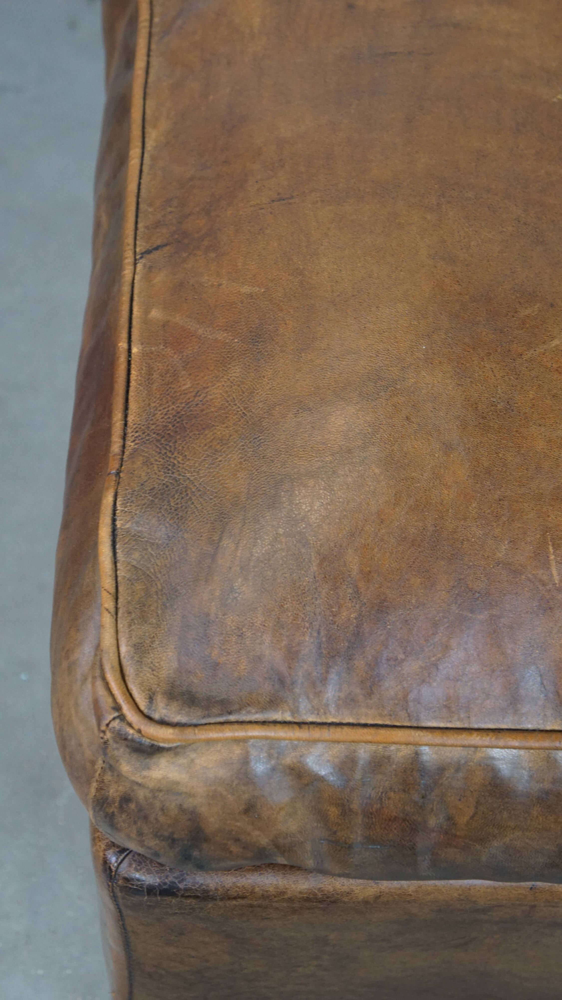 Sheepskin wing chair + XXL patinated footrest