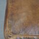 Sheepskin wing chair + XXL patinated footrest