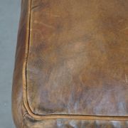 Sheepskin wing chair + XXL patinated footrest