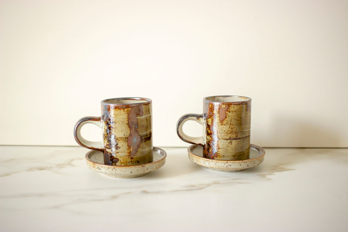 Pair of stoneware cups and sub-cups