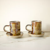 Pair of stoneware cups and sub-cups