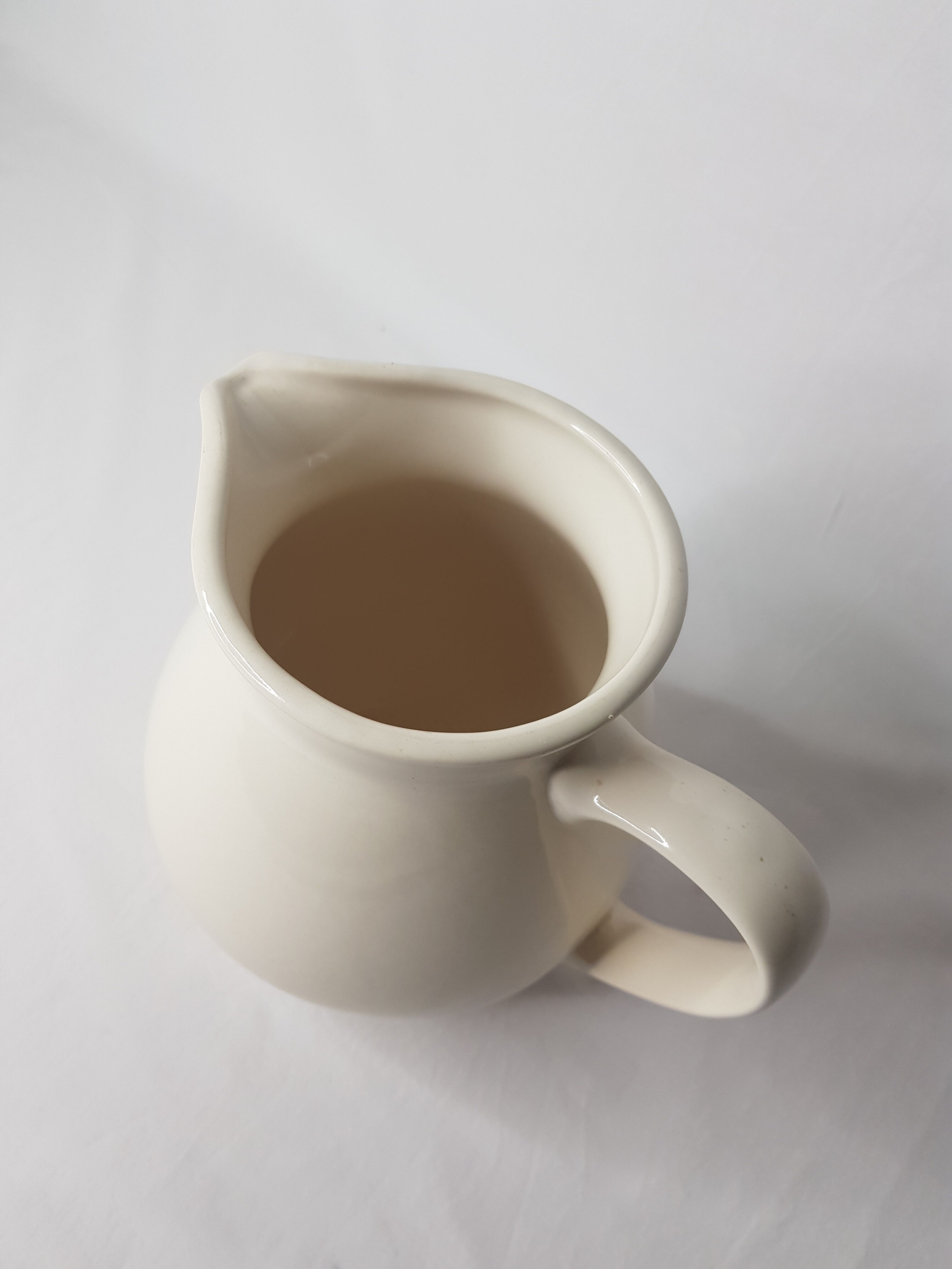 Milk in ceramic pot