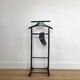Vintage children's room valet in green varnished wood on roulette