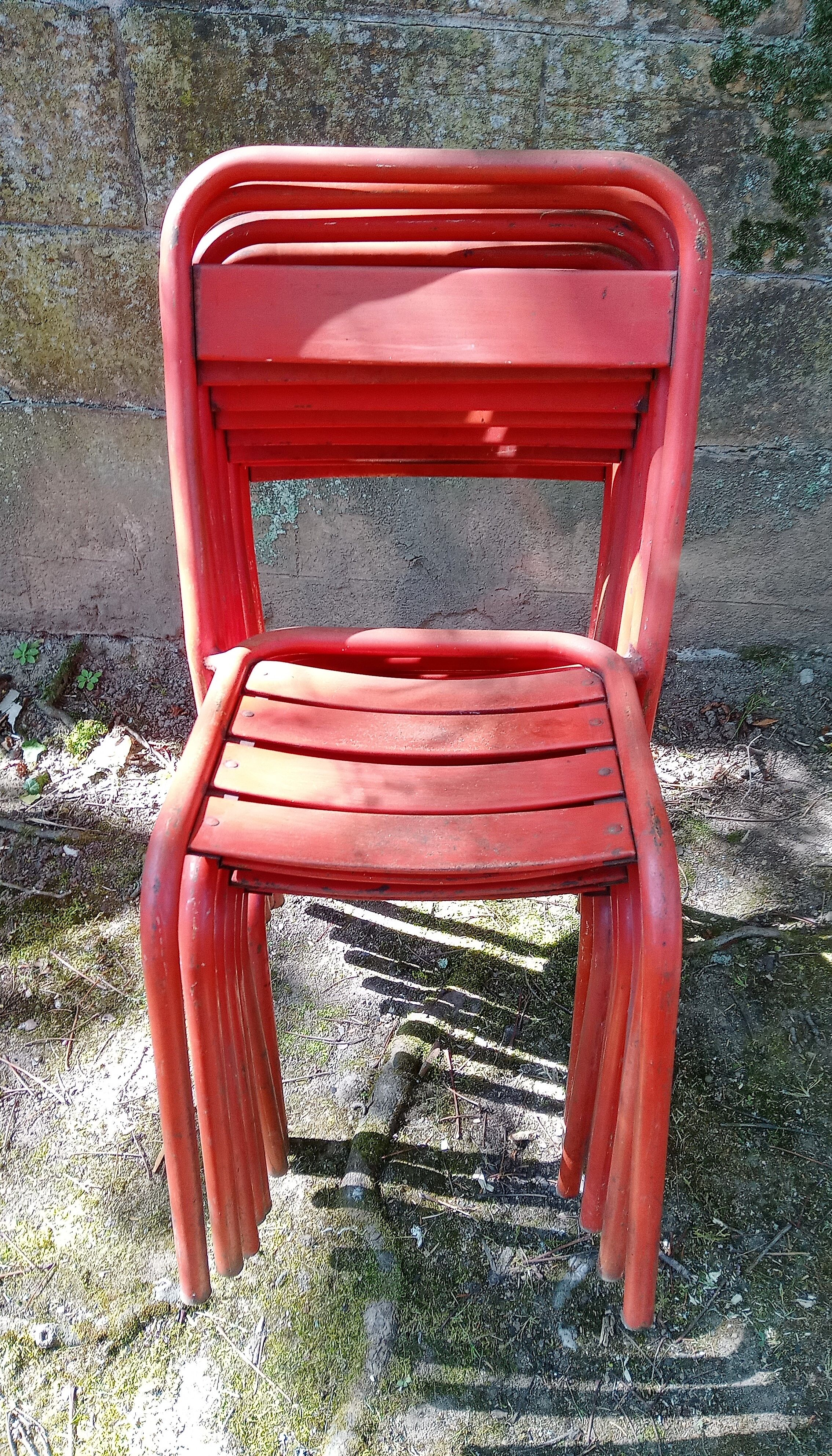 Series of 8 red Tolix chairs