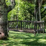 Black lacquered teak rocking chair