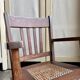 Children's rocking chair in dark wood and cane