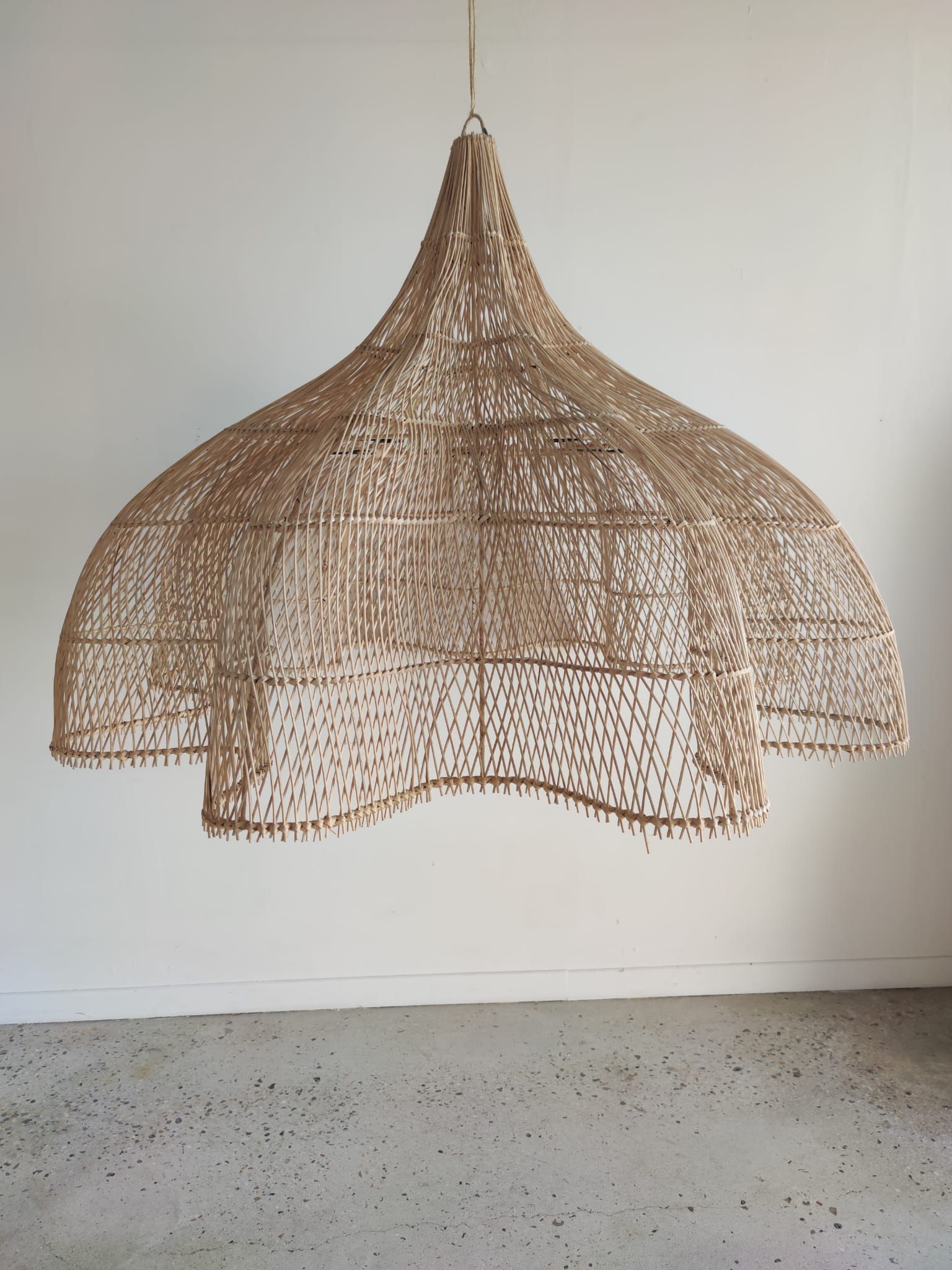 Huge rattan suspension in the shape of a corolla H:1m; D: 1m50