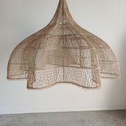 Huge rattan suspension in the shape of a corolla H:1m; D: 1m50