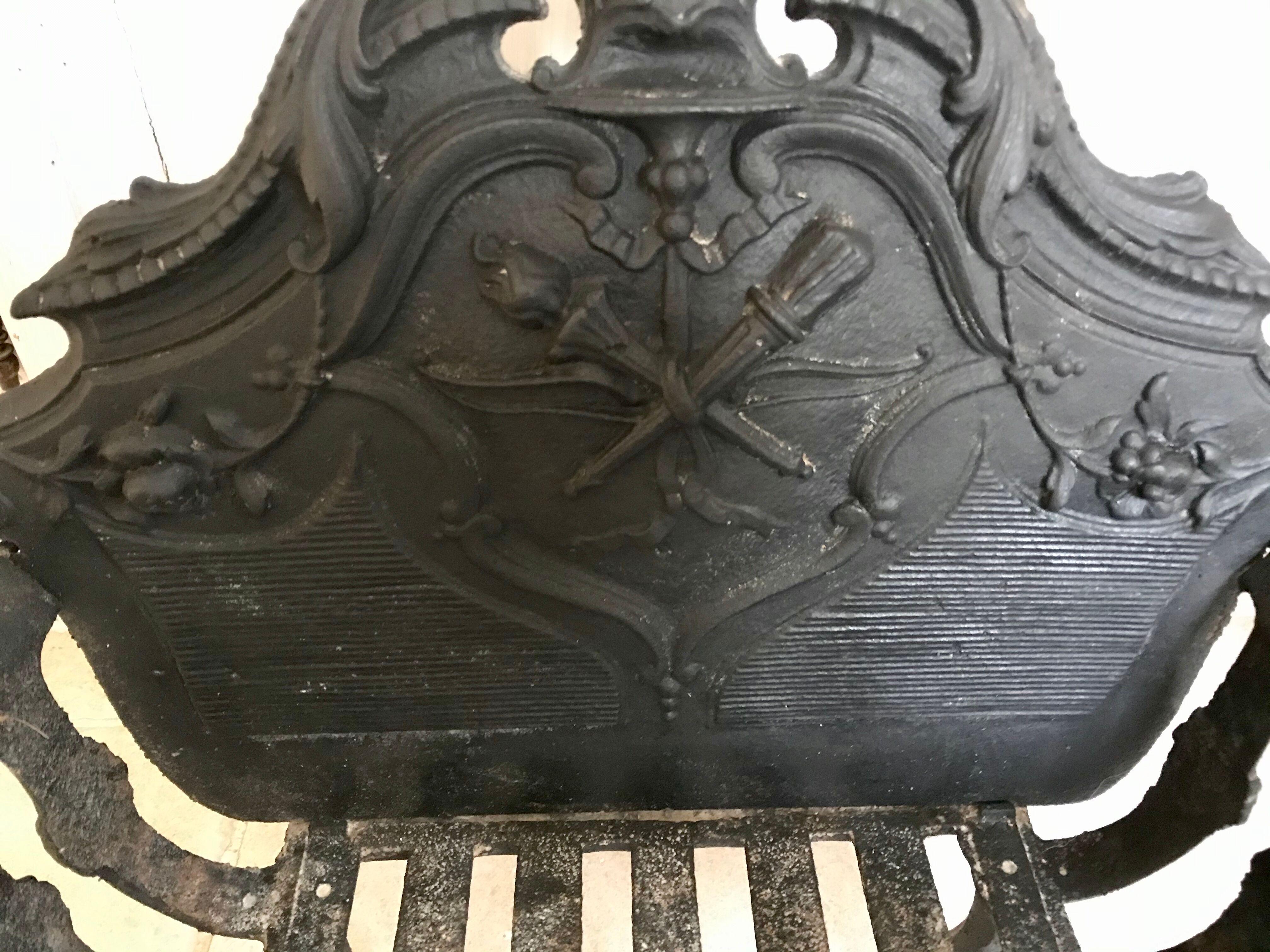 Cast iron fireplace cradle log holder
