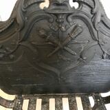 Cast iron fireplace cradle log holder