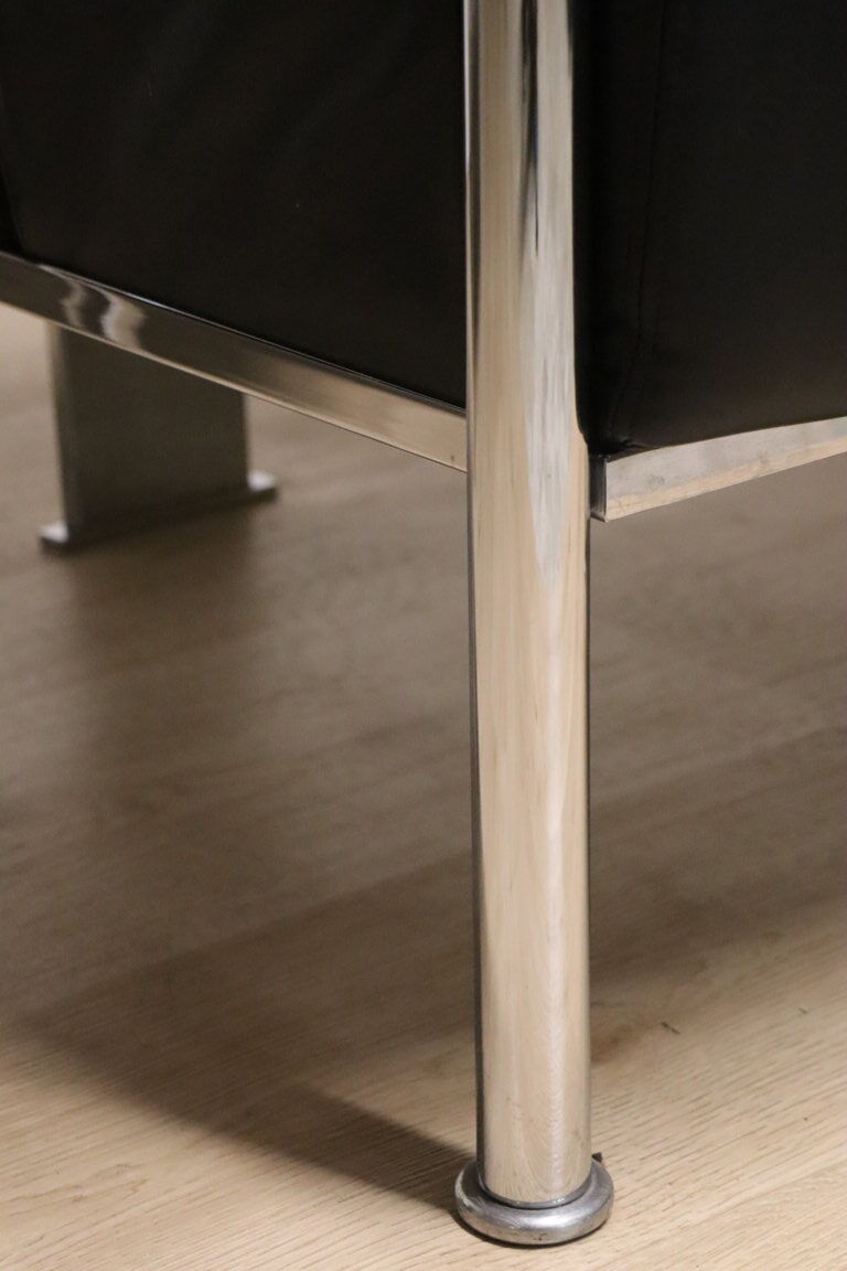 Pair of armchairs in synthetic leather and chromed metal, 1970