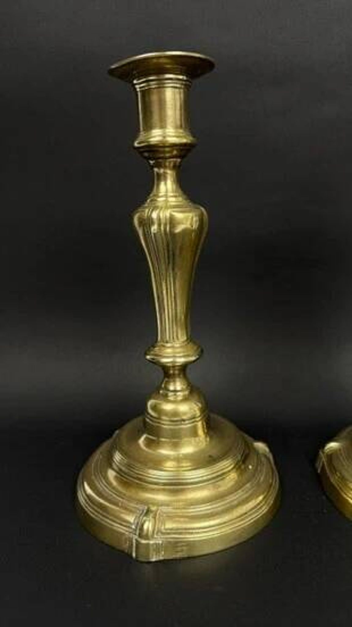 Pair of gilded bronze candlesticks from the Regency period, 18th century.