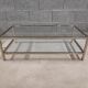 Vintage bevelled glass coffee table and lightly gilded square metal tubes from the 70s/80s