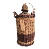 Glass and wicker cylinder