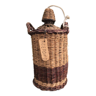 Glass and wicker cylinder