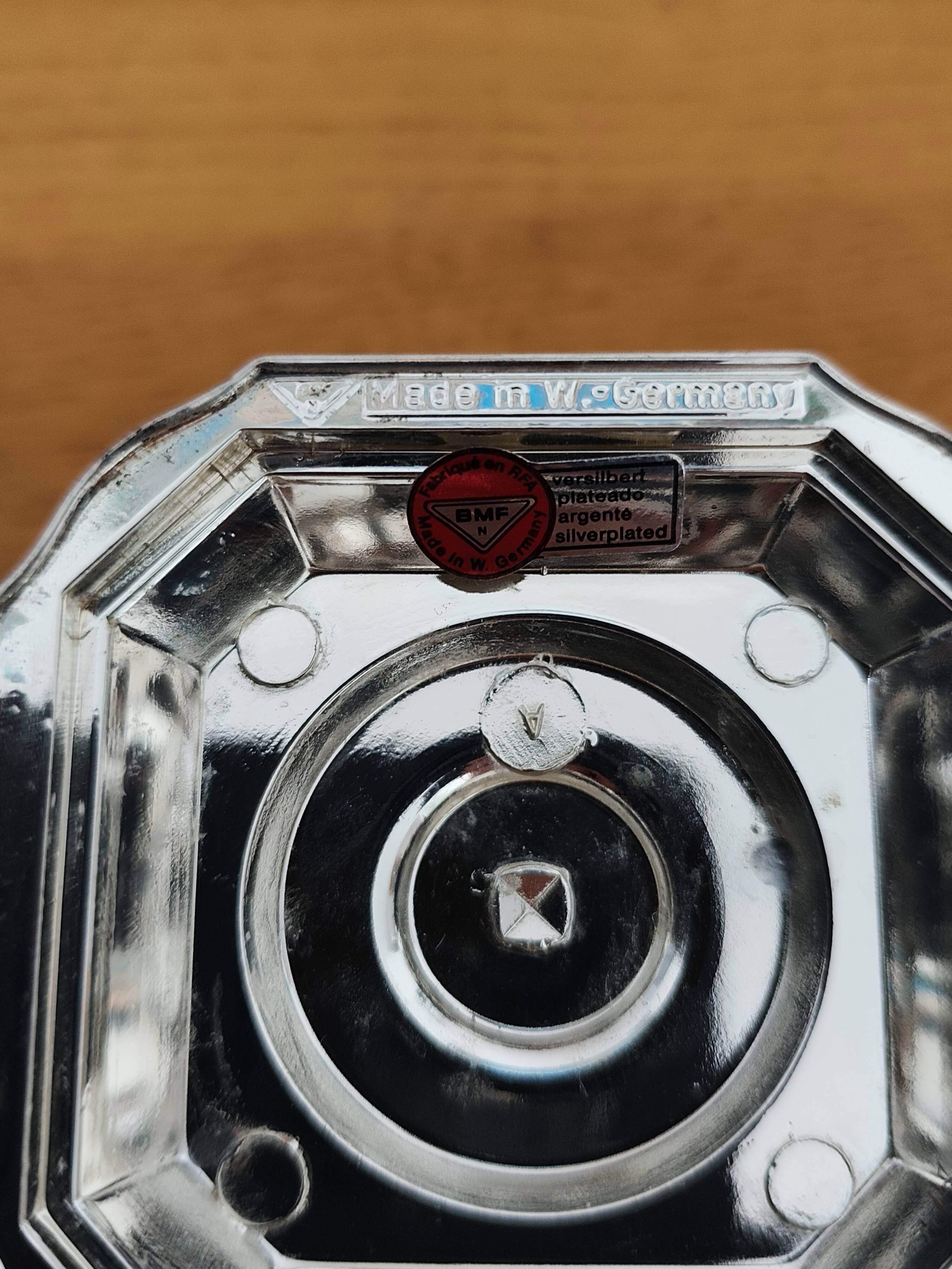 Pair of antique silver-plated candlesticks
