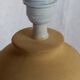 Terracotta lamp foot, floral decoration in strong relief.