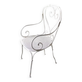 Openwork white wrought iron armchair