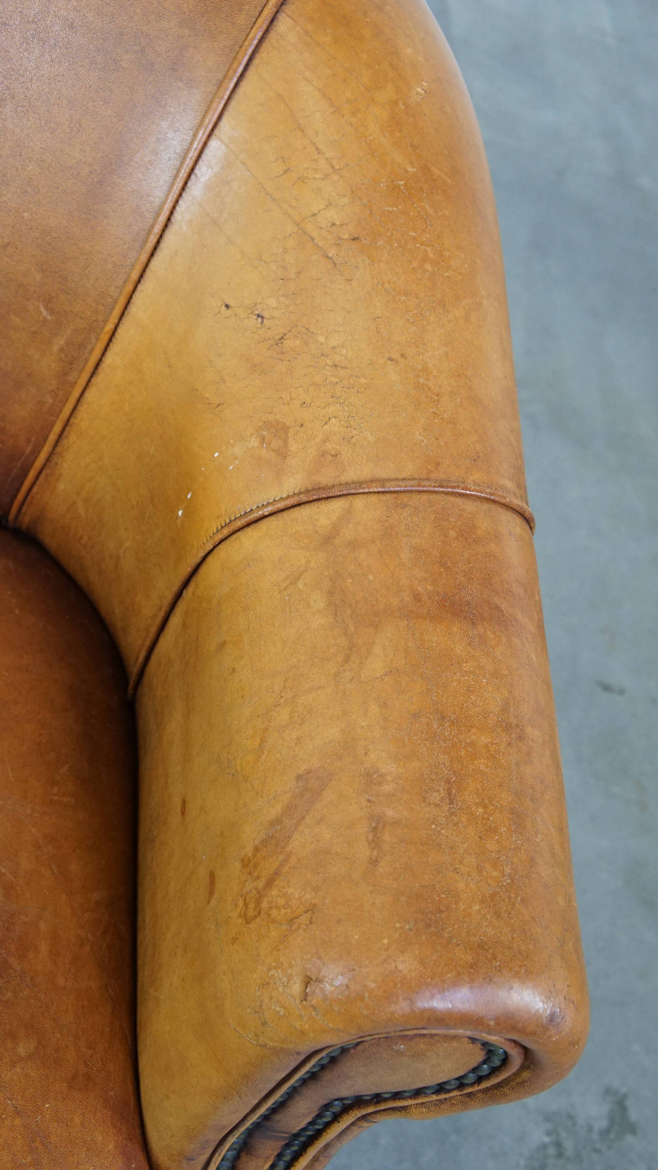 Fauteuil club vintage en cuir de mouton cognac clair