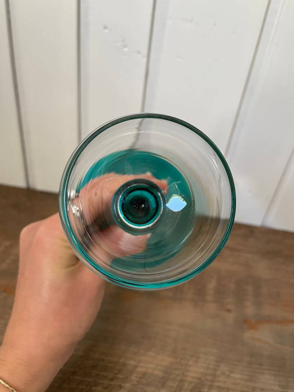 crystal wine glass on green stem