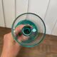 crystal wine glass on green stem