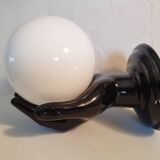 Hand-shaped wall light