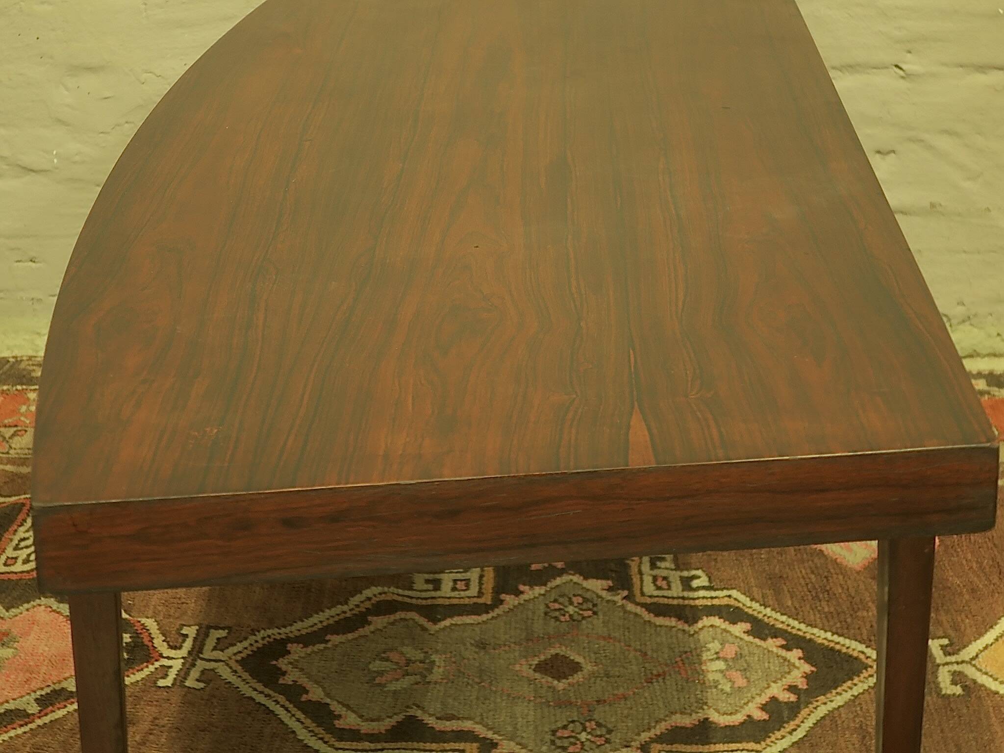 Danish rosewood curved coffee table by Leif Hansen, 1960s