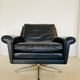 Vintage Danish mid-century leather lounge chair in black leather by G. Thams 1975