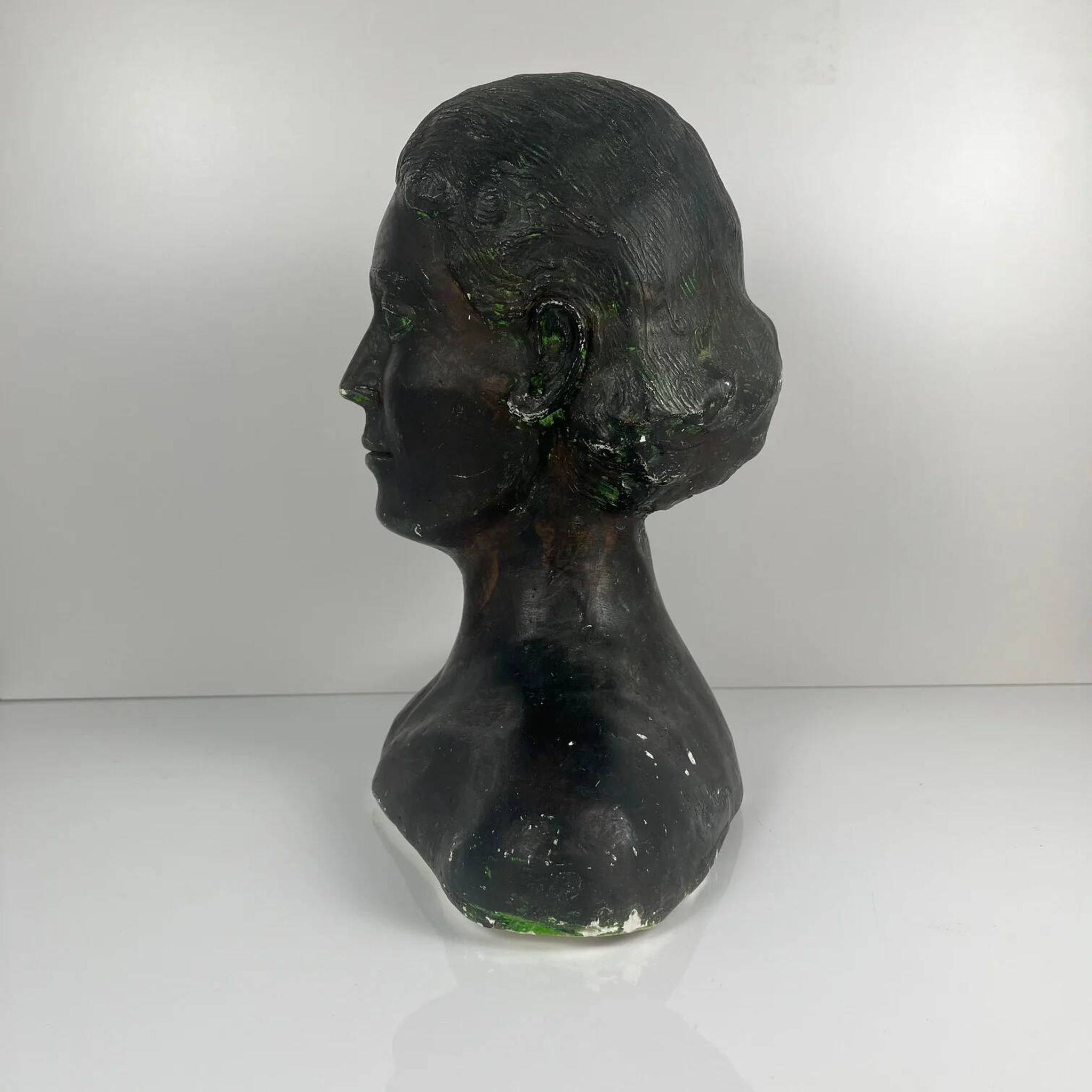 Female bust in neoclassical style in plaster by M. Mongey, 20th century.