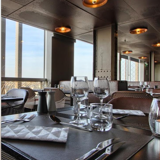 Copper lamp designed by Tom Dixon for the restaurant 58 Eiffel Tower