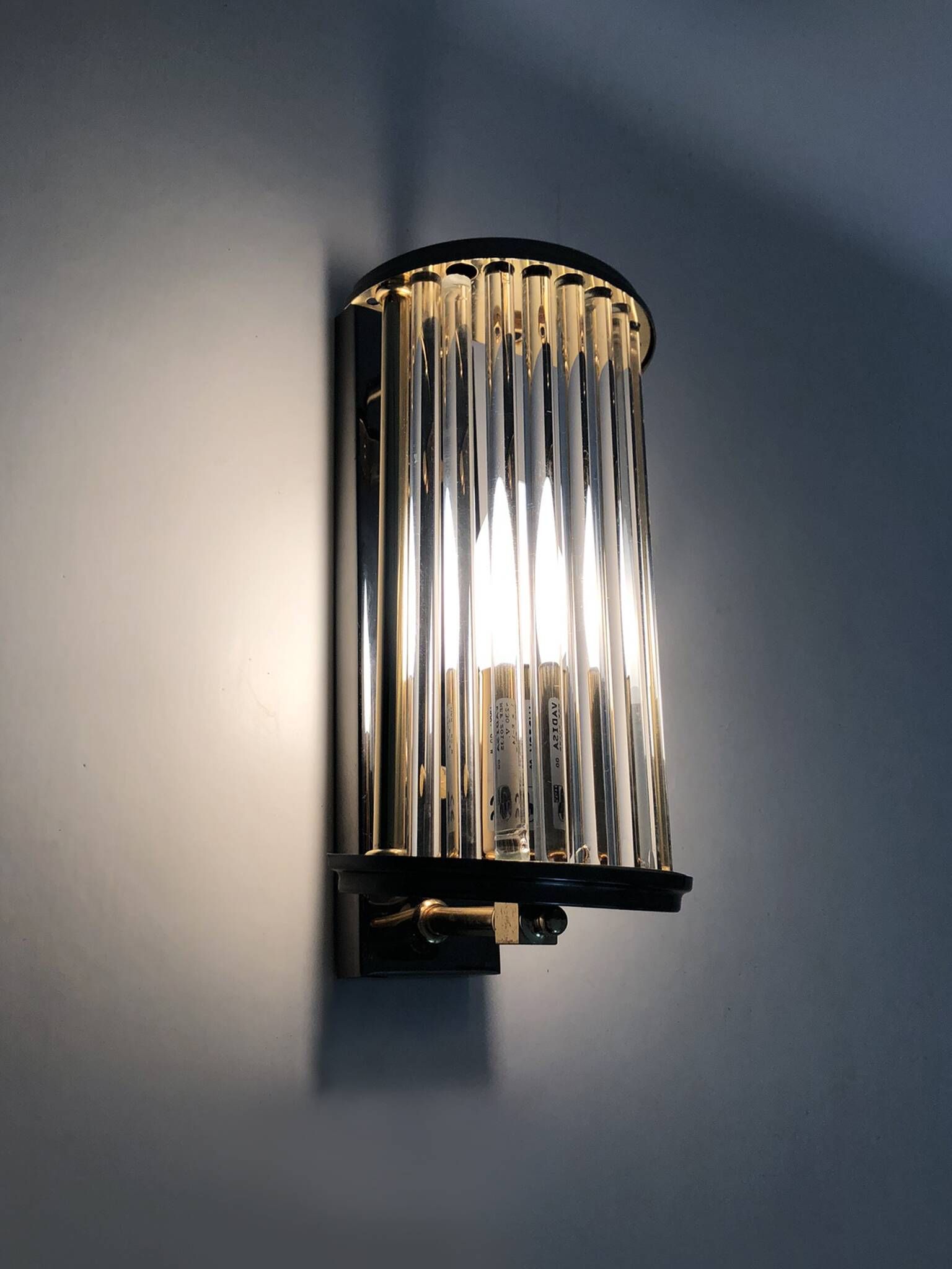 Pair of Art Deco style wall lights, brass, metal and glass GS model Vadisa. 1970s